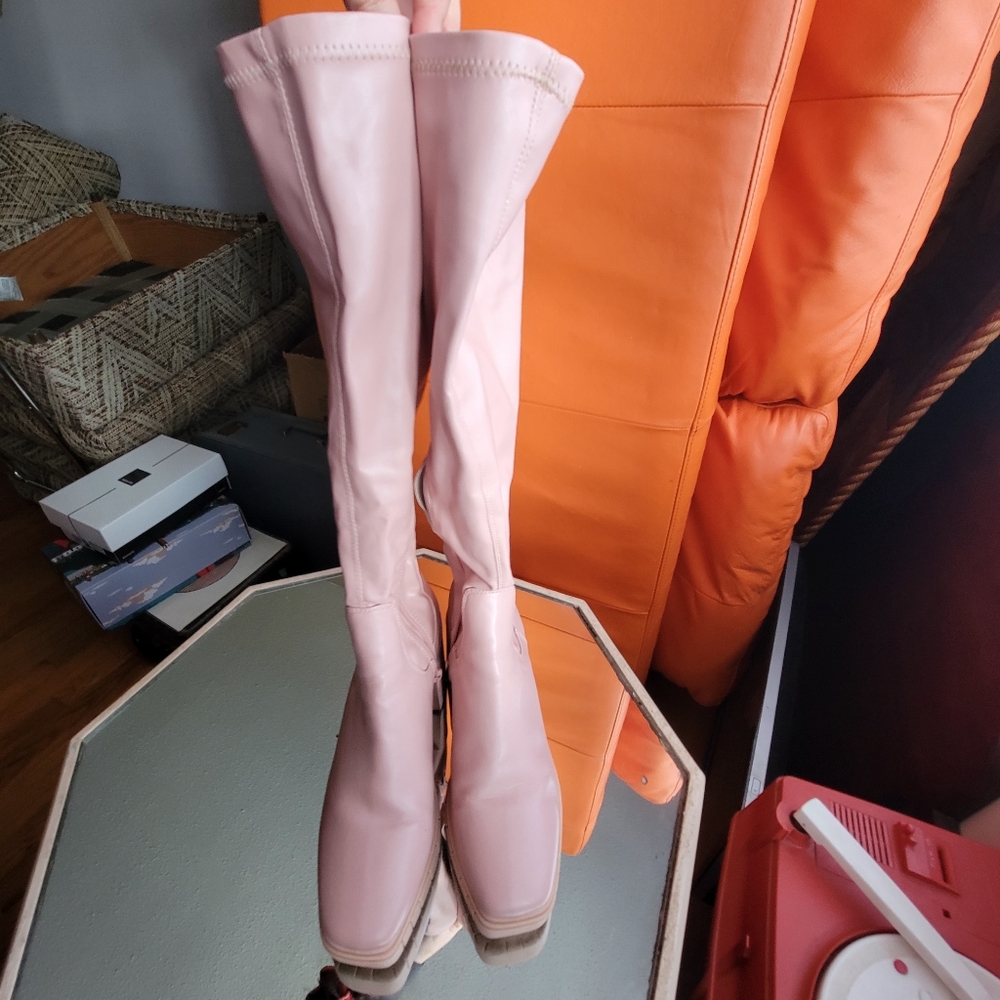 Knee high pink boots